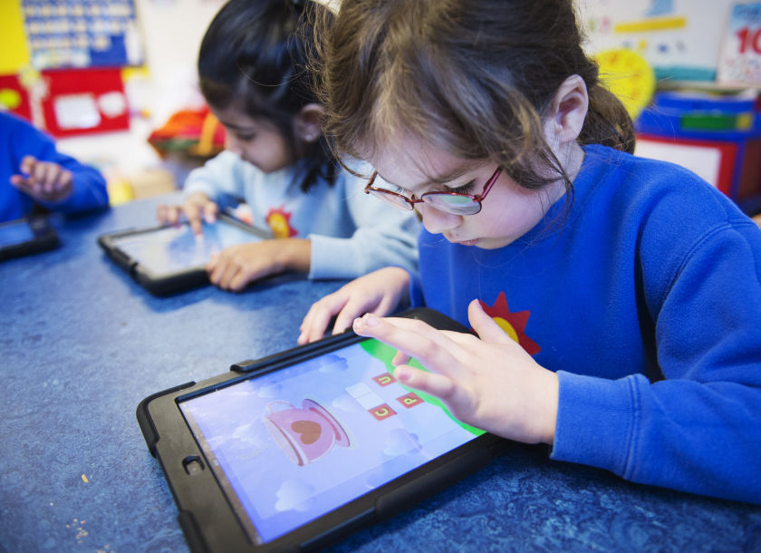 Nursery school pupils work with iPads in Stockholm. Apple will unveil its new iPad in Cupertino, October 16, 2014. u00e2u20acu201d AFP pic