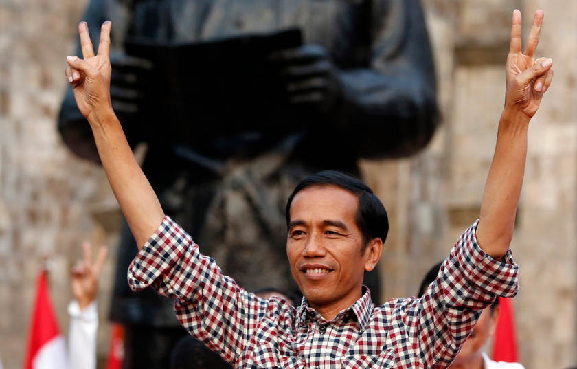 nIndonesian presidential candidate Joko 'Jokowi' Widodo gestures during a rally in Proklamasi Monument Park in Jakarta in this July 9, 2014 file photo. u00e2u20acu201d Reuters pi