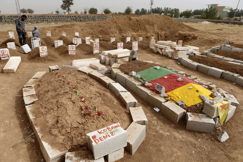 Picture shows the graves of Peopleu00e2u20acu2122s Protection Unit (YPG) fighters who were killed during clashes with IS in Kobani, at a cemetery in the Syrian town of Suruc, October 11, 2014. u00e2u20acu201d Reuters pic