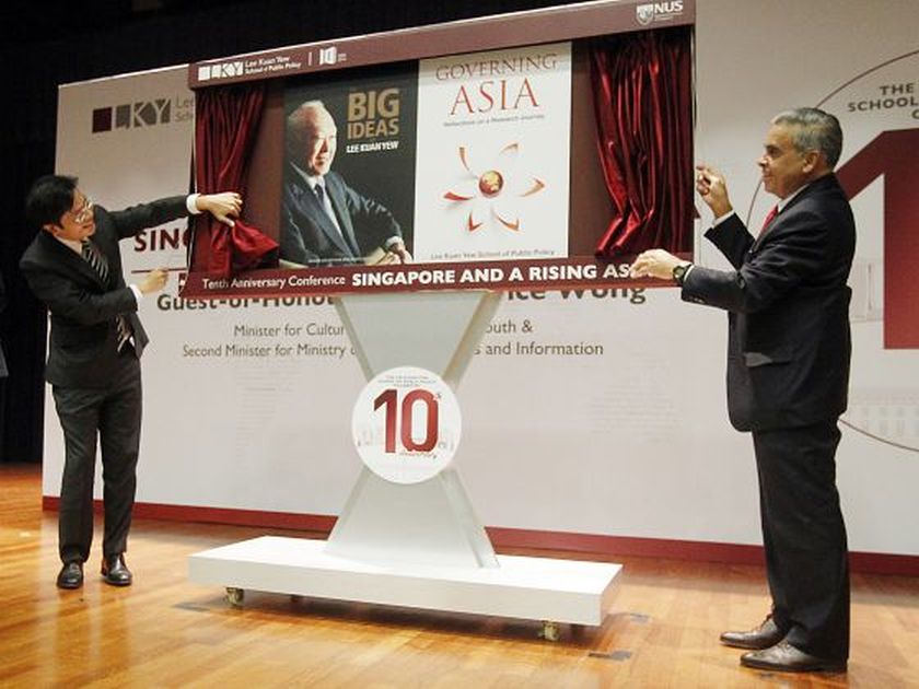 Lawrence Wong (left) and Professor Kishore Mahbubani, Dean of the Lee Kuan Yew School of Public Policy, launching the two new books on public policy at the schoolu00e2u20acu2122s 10th-anniversary conference yesterday. u00e2u20acu2022 Picture by Ernest Chua/Today