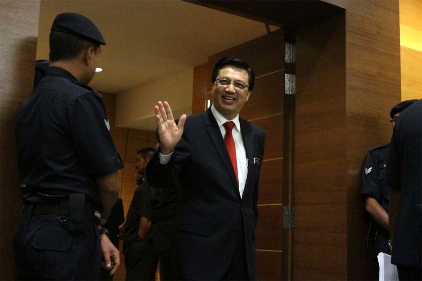 Datuk Seri Liow Tiong Lai waves as he leaves after the tabling of Budget 2015 in Parliament, October 10, 204. u00e2u20acu201d Picture by Yusof Mat Isa