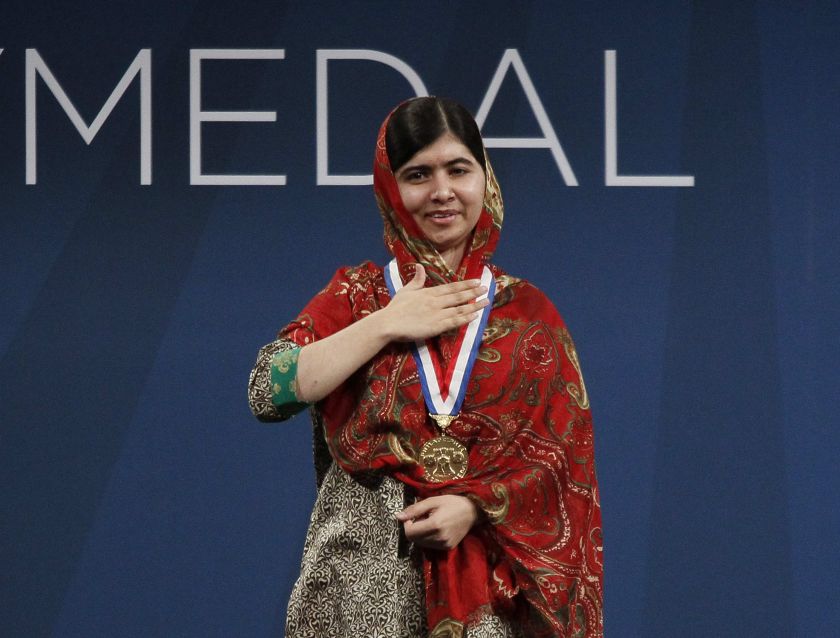 Malala Yousafzai, of Pakistan, gestures as she wears the 2014 Liberty Medal which was presented to her at a ceremony at the National Constitution Center in Philadelphia October 21, 2014.  u00e2u20acu2022 Reuters pic