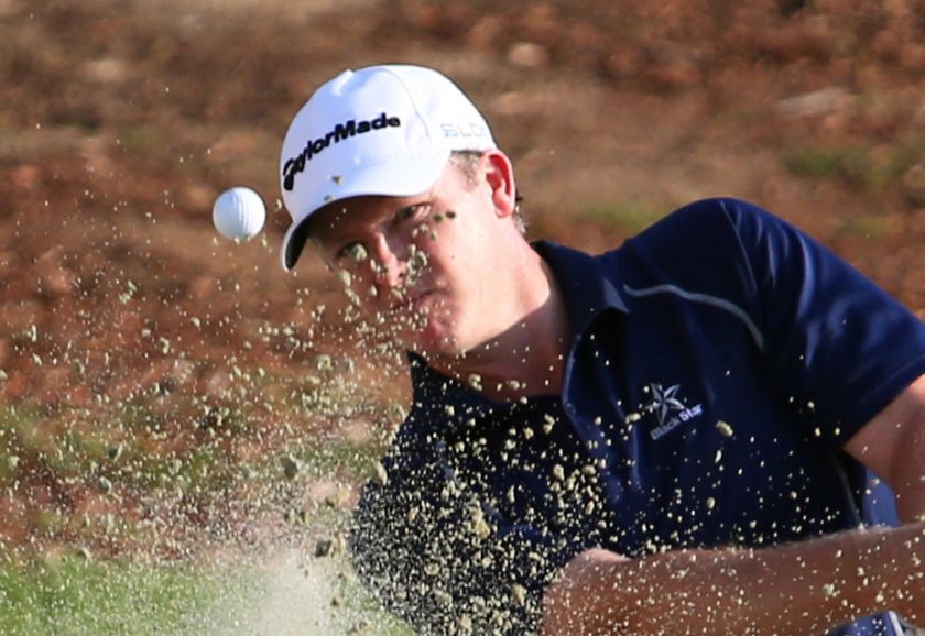 Marcus Fraser of Australia plays a shot during the third day of the DP World Tour Golf Championship in the Gulf emirate of Dubai on November 16, 2013. u00e2u20acu201d AFP pic