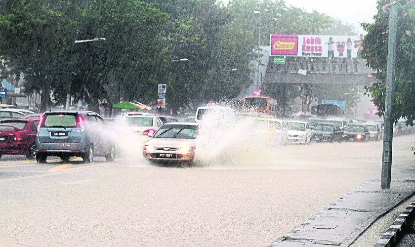 Motorists were caught in a traffic jam for several hours as the roads were submerged in 0.67m of water, in parts of southern Penang Island, October 29, 2014. u00e2u20acu201d Picture by Sayuti Zainudin