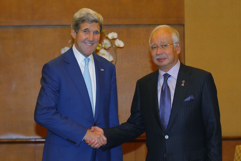 US Secretary of State John Kerry (left) and Prime Minister of Malaysia Datuk Seri Najib Razak shake hands at the beginning of a meeting in Jakarta October 20, 2014. u00e2u20acu2022 Reuters pic