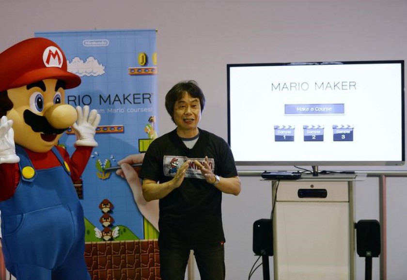 Super Mario Bros creator Shigeru Miyamoto together with Nintendo character Mario (left) are seen during a news conference at the 2014 Electronic Entertainment Expo (E3) in Los Angeles, California June 11, 2014. u00e2u20acu201d Reuters pic