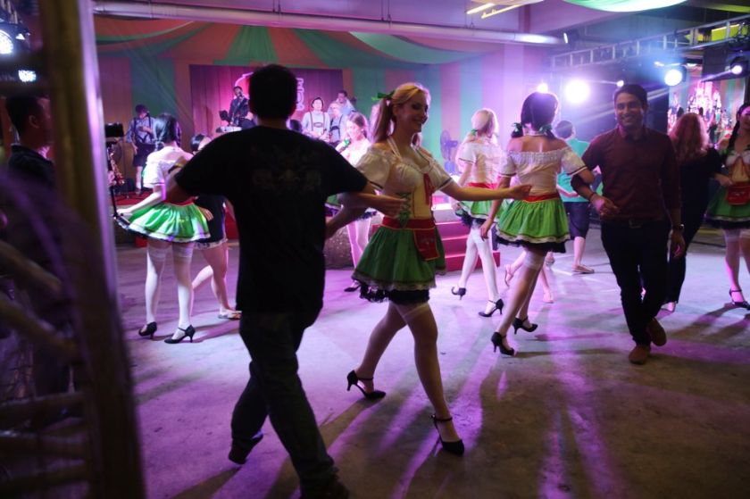 Lederhosen girls dancing the chicken dance with revellers at Oktoberfest held in 1Utama shopping mall in Petaling Jaya, October 11, 2014. u00e2u20acu201d Picture by Choo Choy May