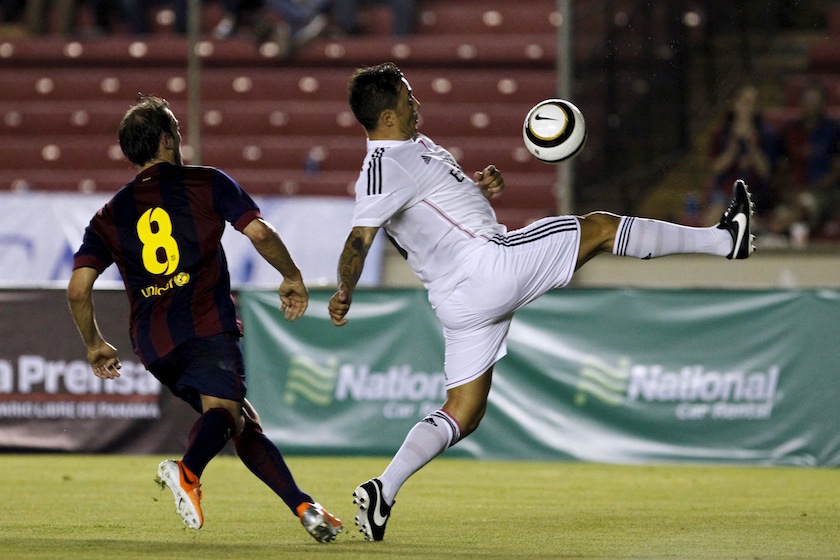 Former Real Madrid player Fabio Cannavaro (right) fights for the ball with former Barcelona player Gaizka Mendieta during an exhibition match known as Legends Cup at the Rommel Fernandez in Panama City October 11, 2014. u00e2u20acu201du00c2u00a0Reuters pic
