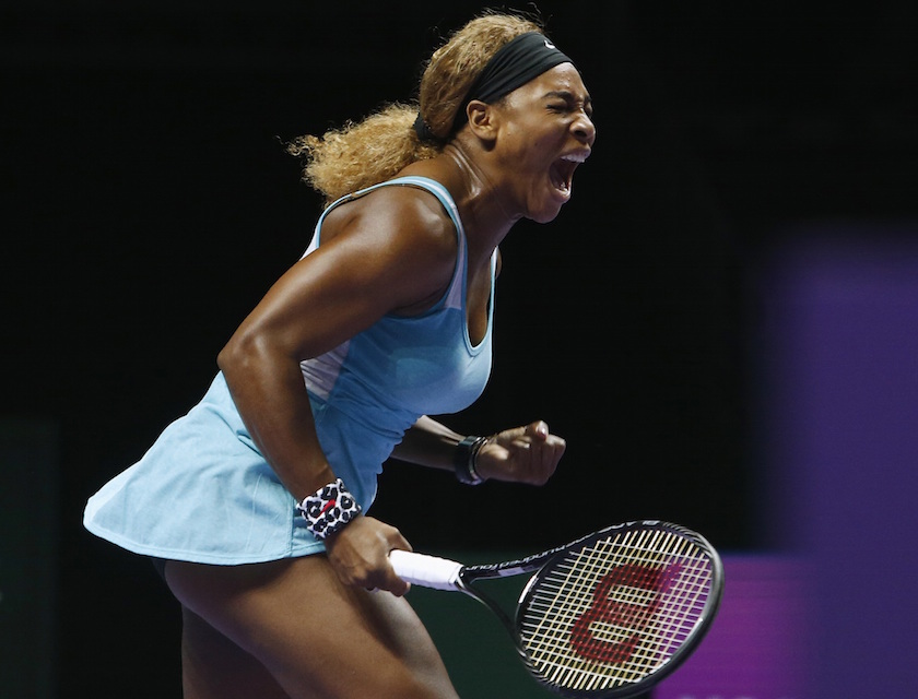 Serena Williams of the US shouts as she wins a point against Caroline Wozniacki of Denmark during their WTA Finals singles semi-finals tennis match at the Singapore Indoor Stadium October 25, 2014. u00e2u20acu201d Reuters pic