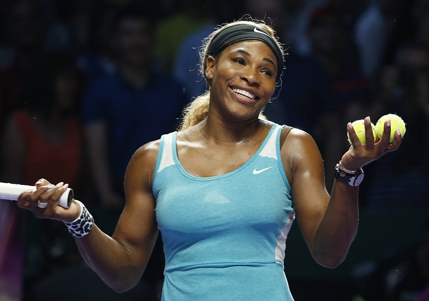 Serena Williams of the US smiles to the crowd after defeating Eugenie Bouchard of Canada during their WTA Finals singles tennis match at the Singapore Indoor Stadium, October 23, 2014. u00e2u20acu201d Reuters pic