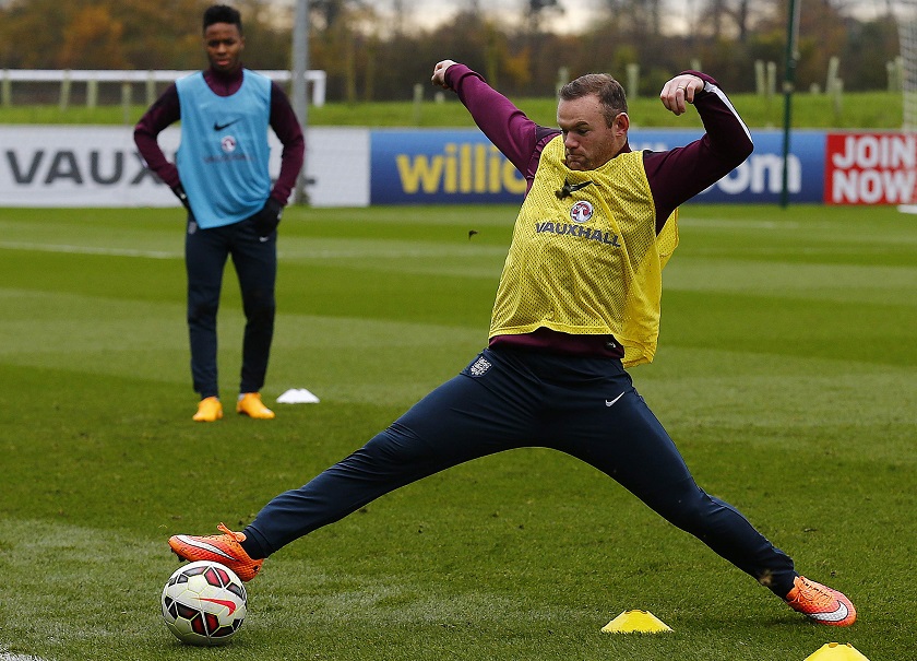 Englandu00e2u20acu2122s Wayne Rooney stretches for the ball during a training session at the St Georgeu00e2u20acu2122s Park training complex near Burton-upon-Trent, central England, November 14, 2014. u00e2u20acu201d Reuter pic