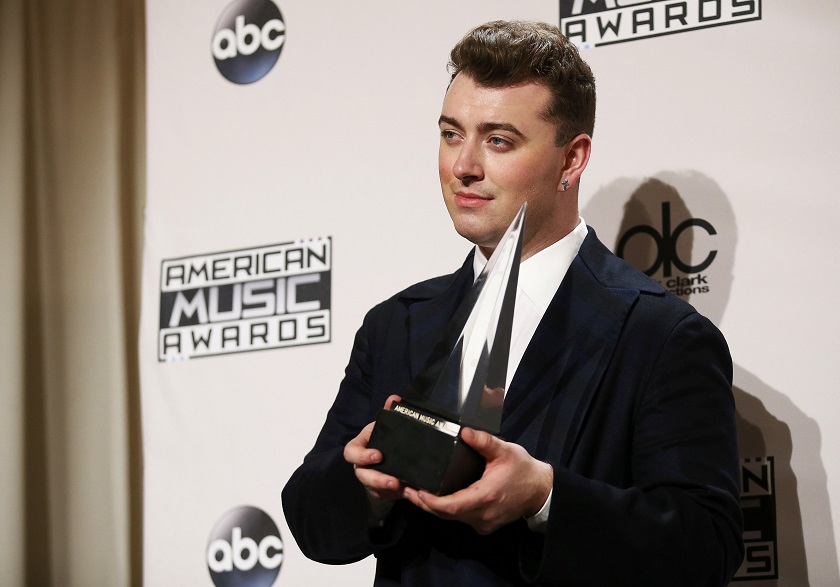 Singer Sam Smith poses backstage with his award for Favourite Pop/Rock Male Artist during the 42nd American Music Awards in Los Angeles, California November 23, 2014.  u00e2u20acu201d Reuters pic
