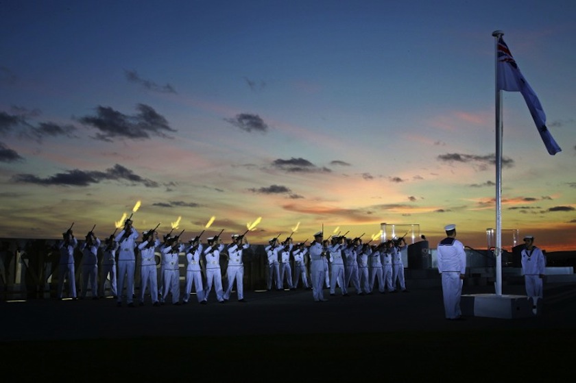 This handout photo released by the Commonwealth of Australia, Department of Defence on October 31, 2014 shows HMAS Stirling guards firing blank volleys during the Ceremonial Sunset at Anzac Peace Park in Albany, Western Australia. u00e2u20acu201d AFP pic