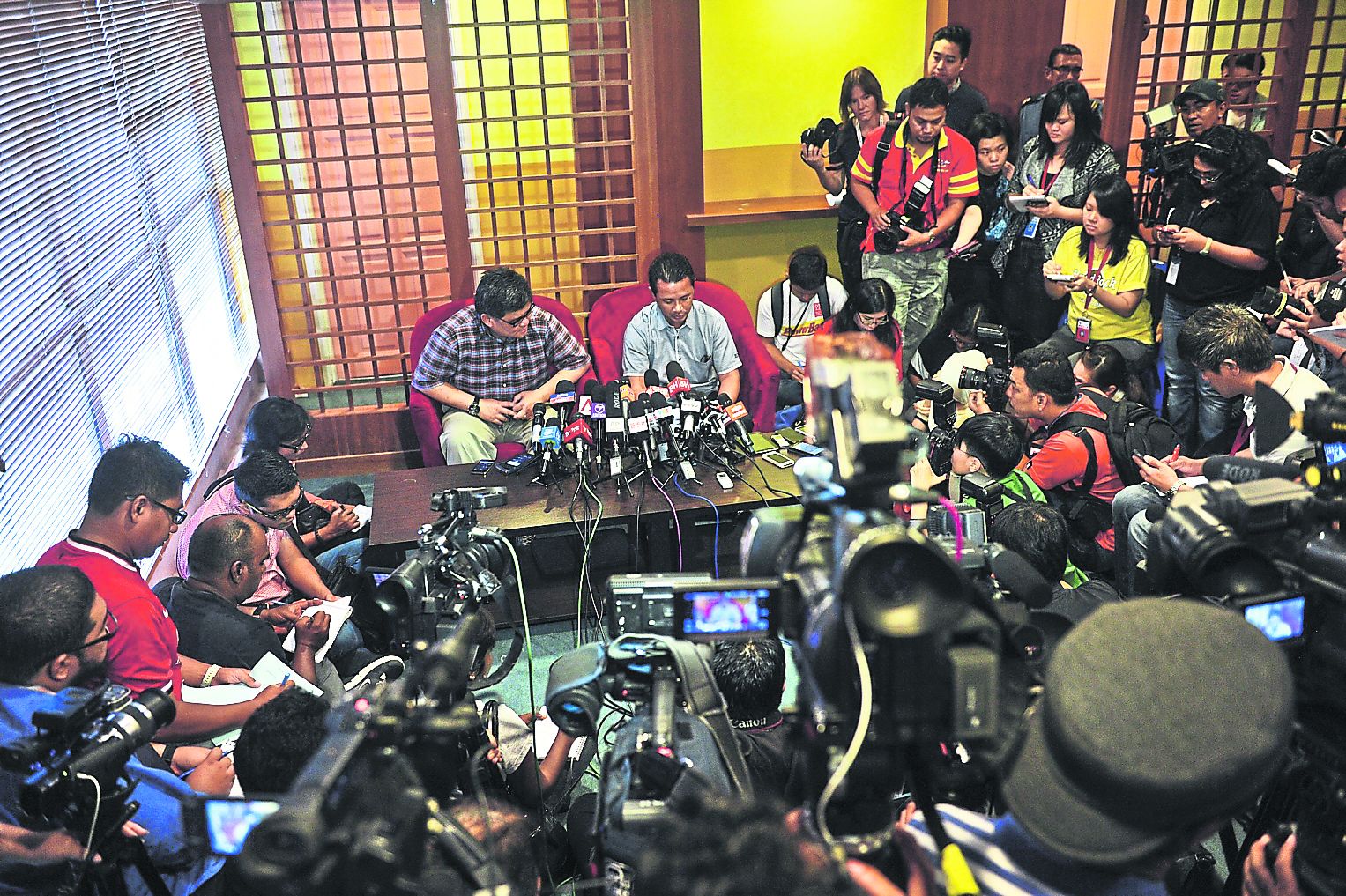 Norza (seated right) and BAM general manager Kenny Goh take questions from the Press but stopped short from revealing the name of the player involved in the doping saga. u00e2u20acu201d Picture by Firdaus Latif
