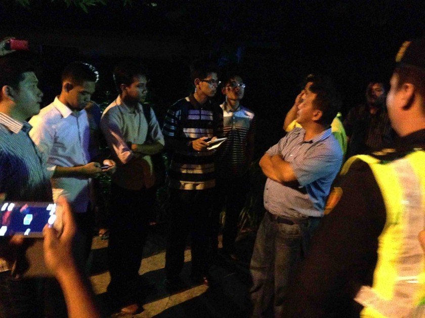 Controversial Universiti Malaya student leader Fahmi Zainol (third from left) and several student activists are questioned by Universiti Malaysia Sabah authorities over their planned unauthorised talk in campus on November 9, 2014. u00e2u20acu201d Picture by Julia Ch