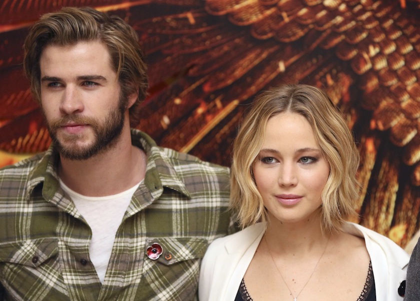 Cast members Liam Hemsworth and Jennifer Lawrence attend the photocall for 'The Hunger Games: Mockingjay Part 1', London, November 9, 2014.u00c2u00a0u00e2u20acu201d Reuters pic