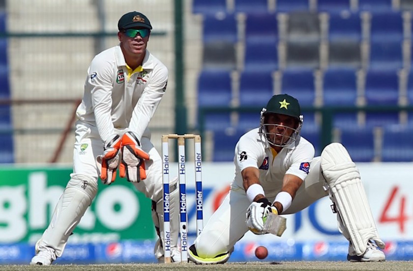 Pakistani batsman Misbah-ul Haq (right) plays a shot during the fourth day of the second test cricket match between Pakistan and Australia in Abu Dhabi November 2, 2014. u00e2u20acu201d AFP pic