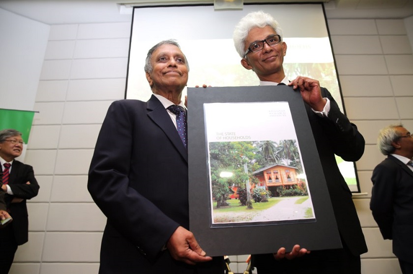 Khazanah Nasional deputy chairman Tan Sri Nor Mohamed Yakcop and KRiS managing director Datuk Charon Mokhzani at the launch of u00e2u20acu02dcThe State of Households Reportu00e2u20acu2122 at Khazanah Research Institute, November 17, 2014. u00e2u20acu201d Picture by Choo Choy May 