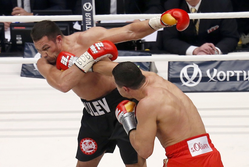 Ukrainian WBA, WBO, IBO and IBF heavyweight boxing world champion Vladimir Klitschko (right) delivers a punch to his challenger Bulgarian Kubrat Pulev during their title fight in Hamburg, November 15, 2014. u00e2u20acu201d Reuters pic