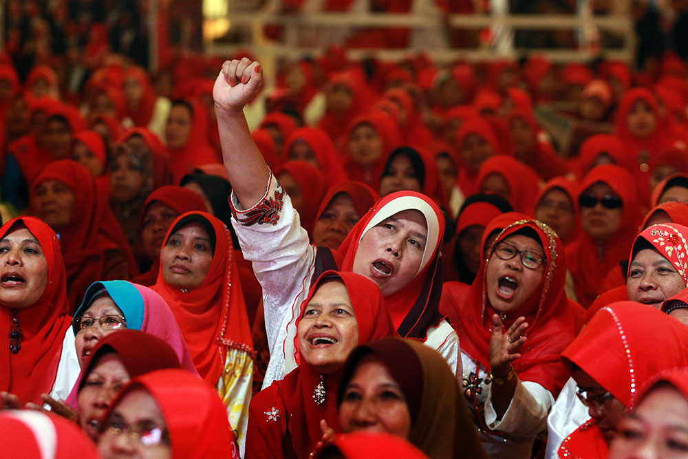 Wanita members attending the UMNO General Assembly at PWTC in Kuala Lumpur, November 26, 2014. u00e2u20acu201d Picture by Yusof Mat Isa