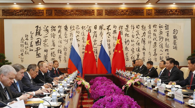 Russia's President Vladimir Putin and his Chinese counterpart Xi Jinping (second right) meet during a bilateral meeting at the Diaoyutai State Guesthouse in Beijing, November 9, 2014. u00e2u20acu201d Reuters pic