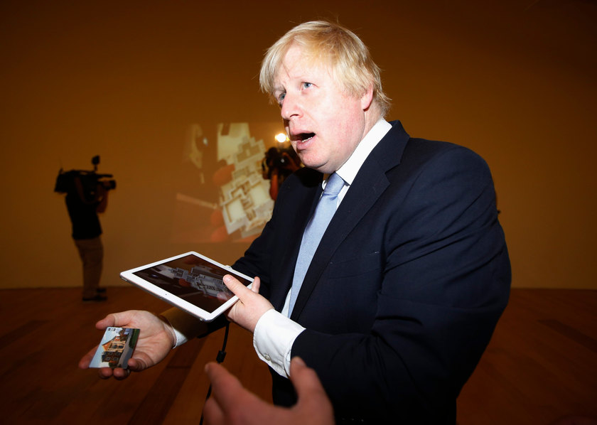 Mayor of London Boris Johnson is shown a technology demonstration of the Vieweet virtual tour app at the Art Science Museum in Singapore November 28, 2014 u00e2u20acu201d Reuters pic