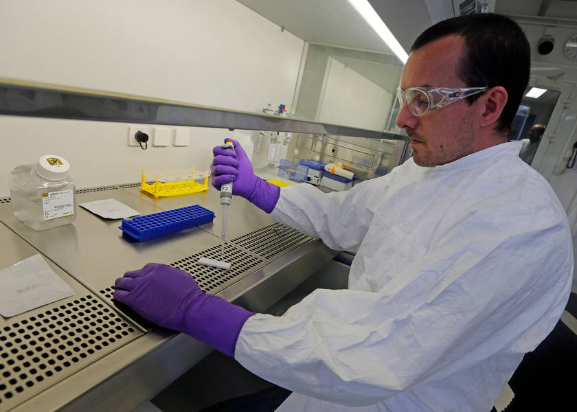 A researcher of the Atomic Energy Commission (CEA) checks an Ebola diagnostic test in Marcoule, November 4, 2014. u00e2u20acu201d Reuters pic