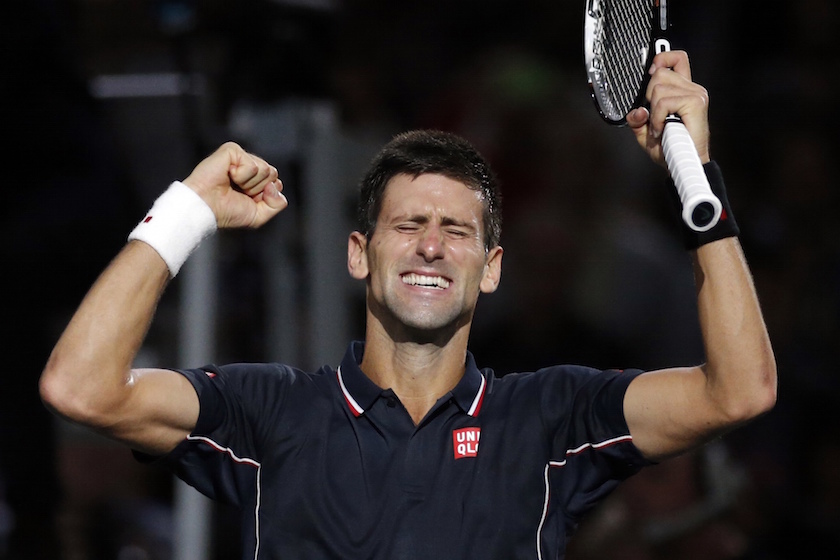 Novak Djokovic of Serbia celebrates after winning against Milos Raonic of Canada during the menu00e2u20acu2122s singles final tennis match at the Paris Masters tennis tournament in Paris, November 2, 2014. u00e2u20acu201d Reuters pic