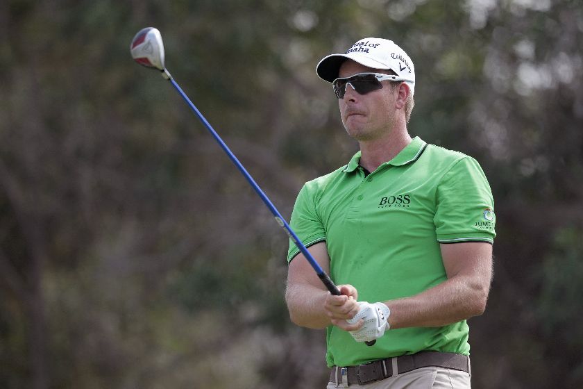 Henrik Stenson of Sweden in the second round of the DP World Tour Championship in Dubai November 21, 2014. REUTERS/Nikhil Monteiro