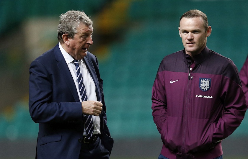 England's manager Roy Hodgson talks to Wayne Rooney as they inspect the pitch ahead of Tuesday's international friendly match against Scotland at Celtic Park Stadium in Glasgow, Scotland November 17, 2014. u00e2u20acu201du00c2u00a0Reuters pic