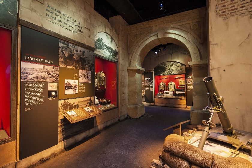 One of eight rooms of the new exhibit replete with faux-newsreel footage, period objects such as this Howitzer artillery piece, and interactive stations that allow visitors to follow the story of a particular soldier or civilian at multiple points during the war.