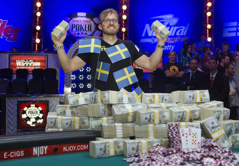 Martin Jacobson poses with cash after beating Felix Stephensen of Norway to win the US$10 million first prize during the 2014 World Series of Poker main event in Las Vegas, Nevada, November 11, 2014. u00e2u20acu201d Reuters pic