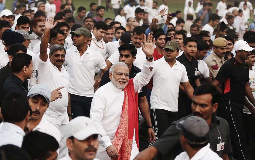 Indian Prime Minister Narendra Modi waves as he takes part in a run for unity after flagging it off to mark the birth anniversary of Indian freedom fighter and a lawmaker Sardar Vallabhbhai Patel, in New Delhi, November 1, 2014. u00e2u20acu201d Reuters pic