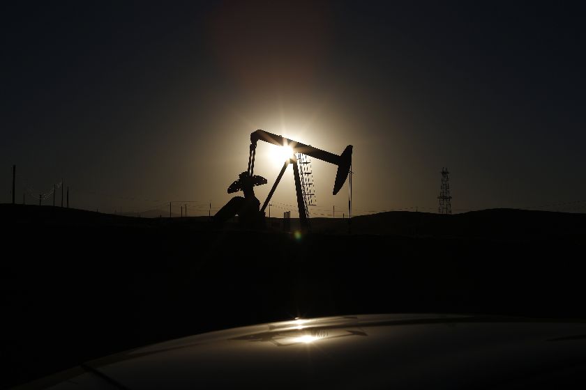 A pump jack is seen at sunrise near Bakersfield, California October 14, 2014 Reuters