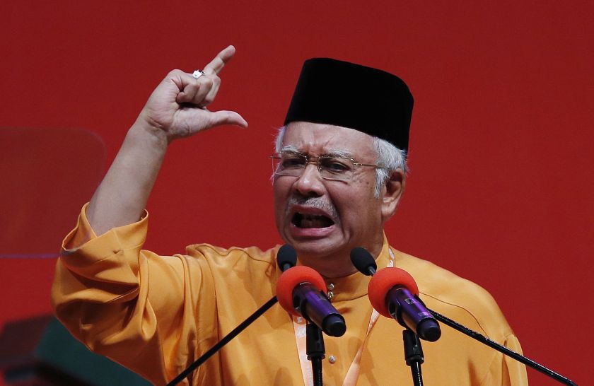 Prime Minister Datuk Seri Najib Razak gestures as he gives the keynote address during the Umno general assembly at the Putra World Trade Centre in Kuala Lumpur November 27, 2014. u00e2u20acu201d Reuters pic