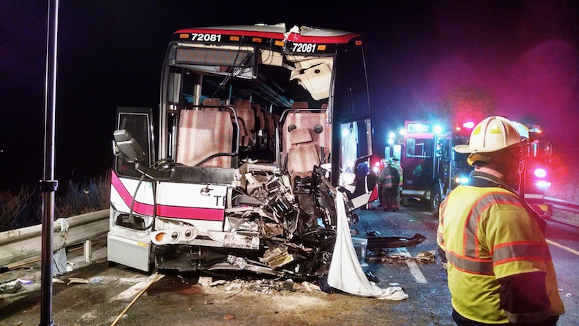 Emergency personnel attend to the scene of a bus accident in this handout photo provided by the Onondaga County Sheriff's Office. The tour bus slammed into a car abandoned by an accused drunken driver on Interstate 81 near Syracuse on November 6, 2014.u00c2u00a0u00e2