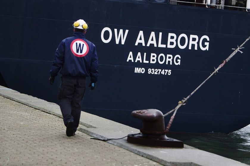 A picture taken on December 1, 2010 shows a worker of Danish ship fuel supplier OW Bunker walking in front of oil and chemical tanker OW Aalborg in Copenhagen. u00e2u20acu201d AFP pic