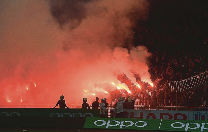 JDT’s  supporters light up flares after Pahang beat JDT in the Malaysia Cup final at Stadium Bukit Jalil on Saturday. ― Picture by Razak Ghazali