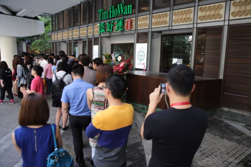 Customers are seen eagerly waiting at the entrance of Tim Ho Wan to taste their famous dim sum, November 28, 2014. u00e2u20acu2022 Picture by Choo Choy May