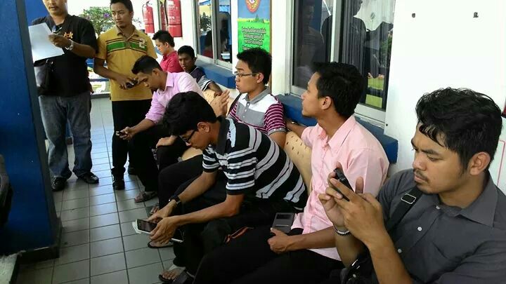 UMS students arrested by police at the Kota Kinabalu police station, November 9, 2014. u00e2u20acu201d Picture courtesy of Fahmi Zainol