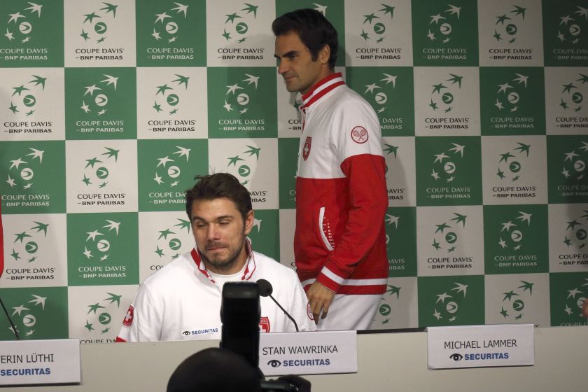 Switzerland's Davis Cup team players Stanislas Wawrinka (left) and Roger Federer attend a news conference at the Pierre Mauroy stadium in Villeneuve d'Ascq, northern France, November 18, 2014. u00e2u20acu2022 Reuters pic