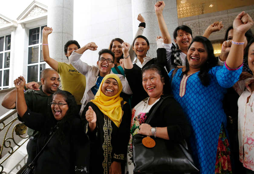 Activists celebrate overturning a shariah law against cross-dressing at the Appeals Court in Putrajaya November 7, 2014.  u00e2u20acu201d Reuters pic