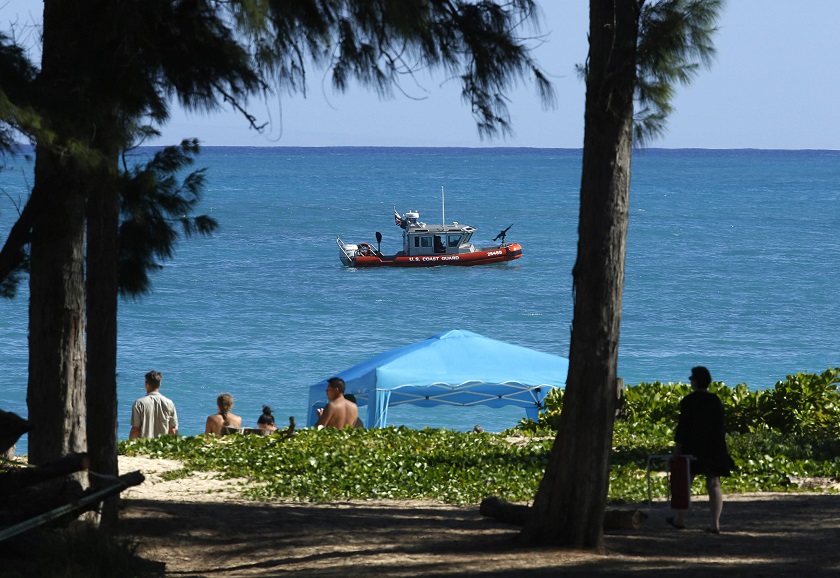 A US Coast Guard boat patrols the waters off of Bellows AFB, Hawaii where US President Barack Obama is visiting December 21, 2014. u00e2u20acu201d Reuters pic