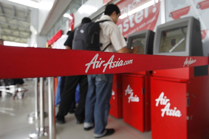Passengers check in an AirAsia flight at Soekarno-Hatta International Airport in Jakarta December 28, 2014. u00e2u20acu201d Reuters pic