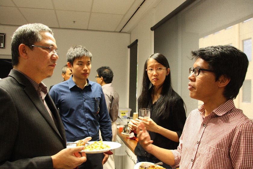 Fadillah (left) at lunch with student Ahmad Hamidi. Between them are Matrade officials Aaron Ong and Christina Soh. u00e2u20acu201d Picture by KC Boey