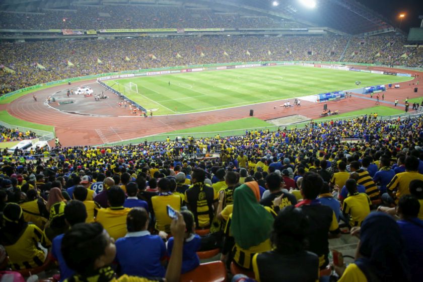 Malaysian fans cheer as Malaysia face Vietnam in the AFF Suzuki Cup 2014 semi-final first leg match at the Shah Alam Stadium, December 7, 2014. u00e2u20acu201d Picture by Choo Choy May