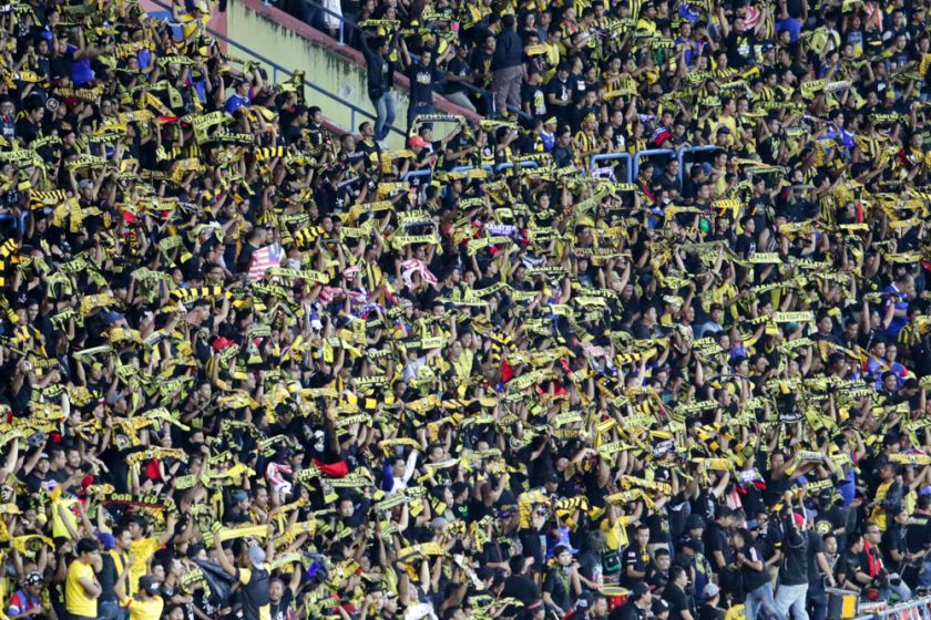 The sea of spectators at the Shah Alam Stadium cheer on as Harimau Malaya face Vietnam in the AFF Suzuki Cup 2014 semi-final first leg match December 7, 2014. u00e2u20acu201d Picture by Choo Choy May