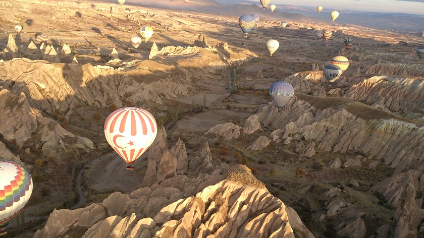 Hot-air balloons are seen over the famed sculpted rock formations of Cappadocia in Turkey in this October 20, 2013 file picture. — Picture by Debra Chong