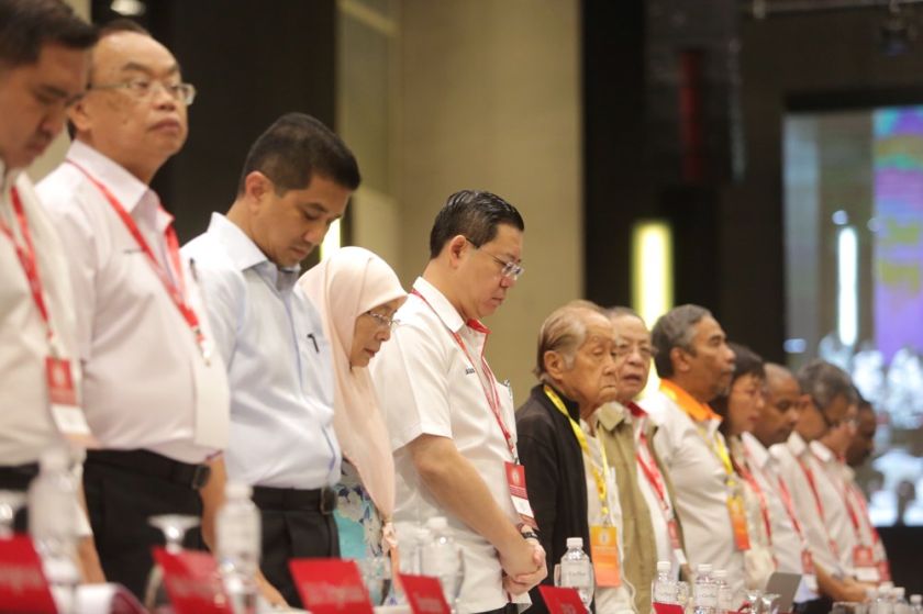 DAP leaders observe a momentu00e2u20acu2122s silence for deceased party members (Karpal Singh,Wong Ho Leng and Sean Leong Peng) at the DAP National Conference 2014, One City Mall, USJ, December 14, 2014. u00e2u20acu201d Picture by Choo Choy May