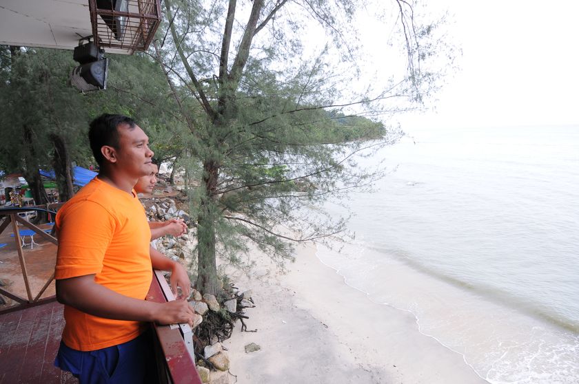 Civil Defence Department officer Jonhlennon Mubin and his colleague at the Baywatch tower in Miami Beach at Batu Ferringhi. u00e2u20acu2022 Picture by K.E.Ooi